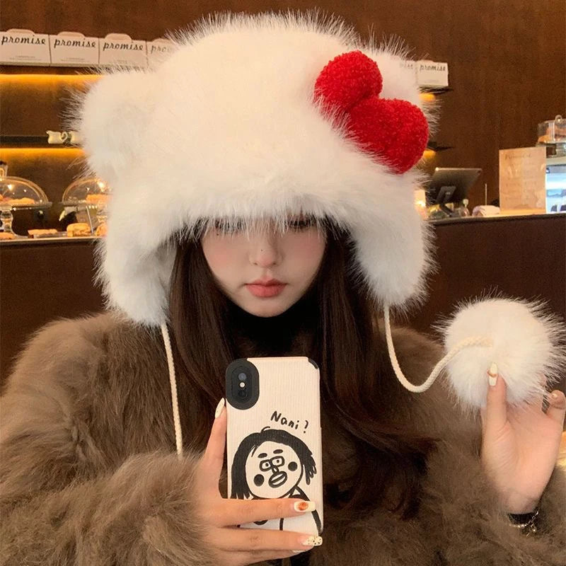Stay warm and stylish with this Hello Kitty Plush Bomber Cap! Featuring a sweet red bow and cozy ear flaps, it’s the perfect winter accessory for Hello Kitty fans