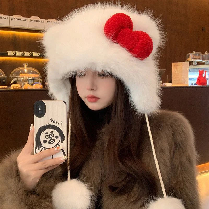 Stay warm and stylish with this Hello Kitty Plush Bomber Cap! Featuring a sweet red bow and cozy ear flaps, it’s the perfect winter accessory for Hello Kitty fans