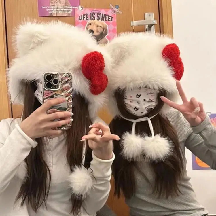 Stay warm and stylish with this Hello Kitty Plush Bomber Cap! Featuring a sweet red bow and cozy ear flaps, it’s the perfect winter accessory for Hello Kitty fans