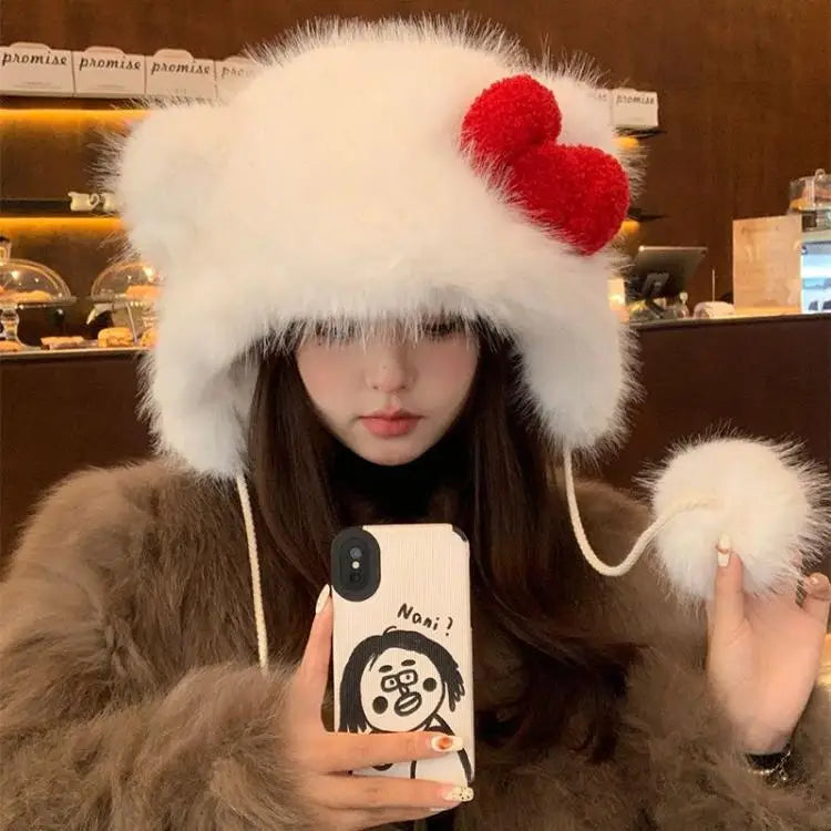 Stay warm and stylish with this Hello Kitty Plush Bomber Cap! Featuring a sweet red bow and cozy ear flaps, it’s the perfect winter accessory for Hello Kitty fans